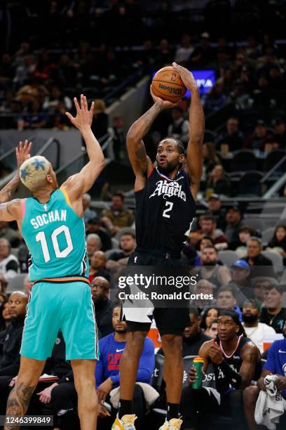 Kawhi Leonard of the Los Angeles Clippers hits a three over Jeremy Sochan of the San Antonio Spurs in the second half at AT&T Center on January 20,...