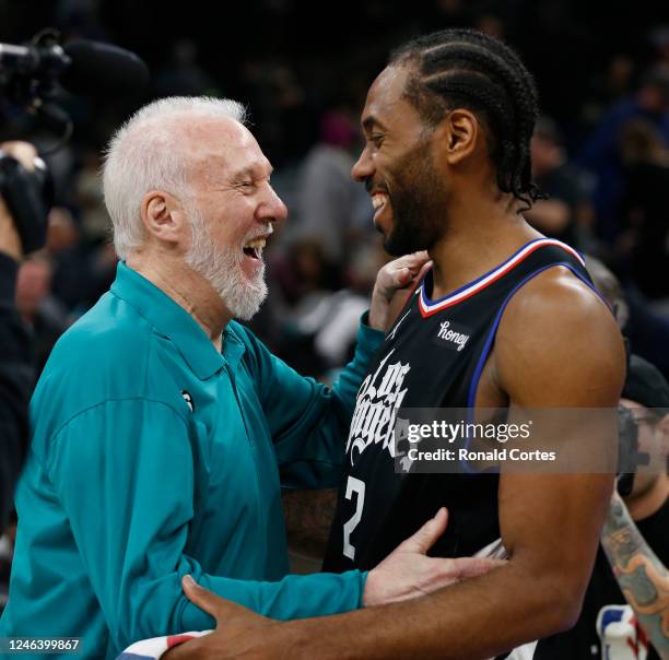 Head coach Gregg Popovich of the San Antonio Spurs greets Kawhi Leonard of the Los Angeles Clippers at the end of the game at AT&T Center on January...