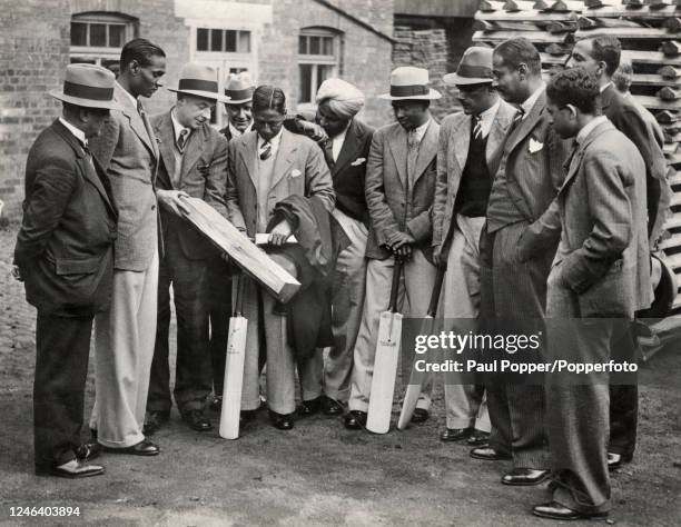 Members of the India cricket team visiting Gunn & Moore's cricket bat factory in Nottingham, circa July 1932.
