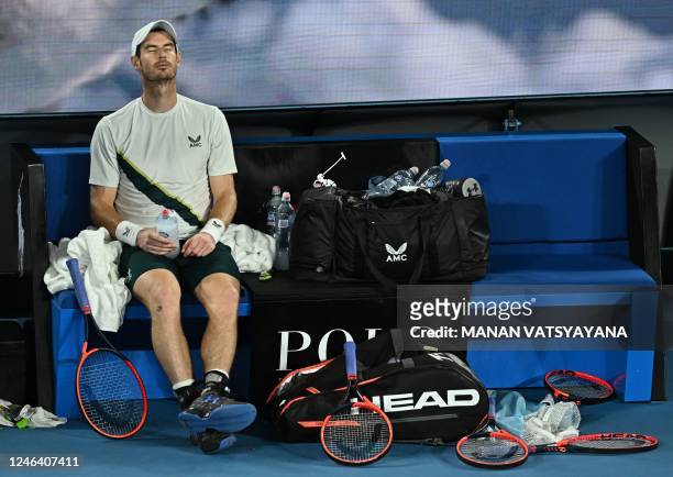 Britain's Andy Murray rests during a break as he plays against Spain's Roberto Bautista Agut during their men's singles match on day six of the...
