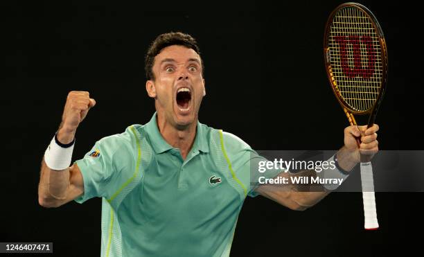 Roberto Bautista Agut of Spain celebrates after winning match point during the third round singles match against Andy Murray of Great Britain during...