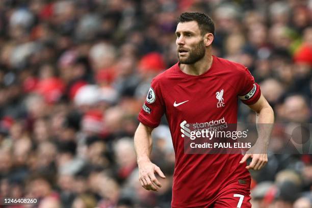 Liverpool's English midfielder James Milner reacts during the English Premier League football match between Liverpool and Chelsea at Anfield in...