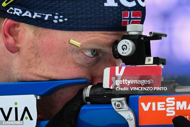 Norway's Johannes Thingnes Boe competes in the IBU Biathlon World Cup Men's 12.5km pursuit race in Rasen-Antholz , Italian Alps, on January 21, 2023.