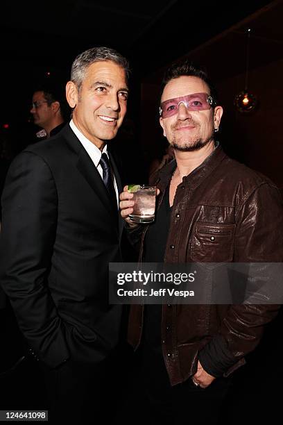 Actor George Clooney and Singer Bono of U2 attend the Fox Searchlight Pictures, Belvedere Vodka And Vanity Fair Celebration of "Martha Marcy May...