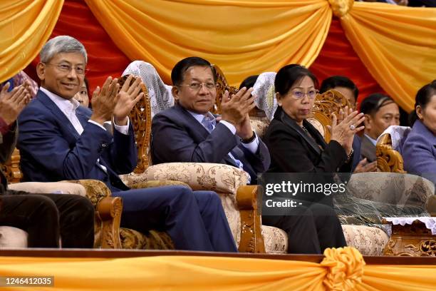 Myanmar's military chief Min Aung Hlaing along with his wife and China's ambassador to Myanmar Chen Hai attend a ceremony on the eve of the Lunar New...