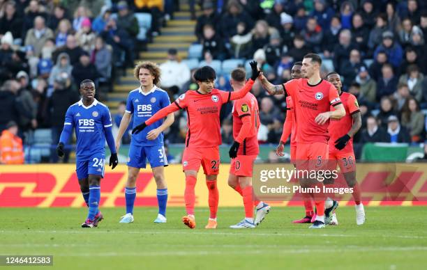 Kaoru Mitoma of Brighton & Hove Albion celebrates after scoring to make it 0-1 during the Premier League match between Leicester City and Brighton &...