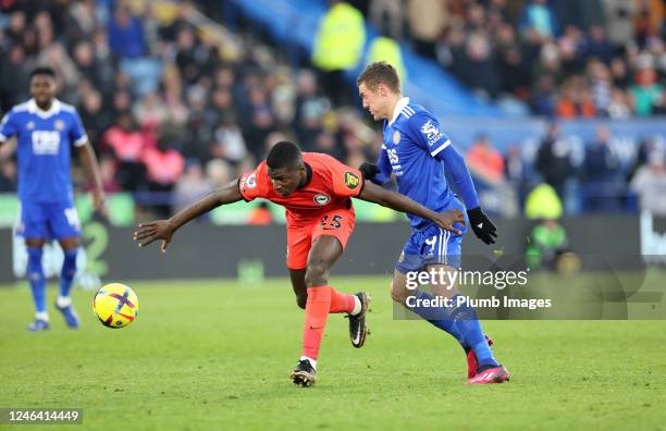 Jamie Vardy of Leicester City in action with Moisés Caicedo of Brighton & Hove Albion during the Premier League match between Leicester City and...