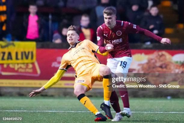 Livingston's Bruce Anderosn is challenged by William Albert Sewell during a Scottish Cup Fourth Round match between Stenhousemuir and Livingston at...