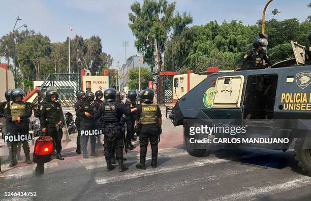 Riot police enters the San Marcos University campus in Lima on January 21 to confront and arrest rioters hiding in the premises. - Civil unrest since...