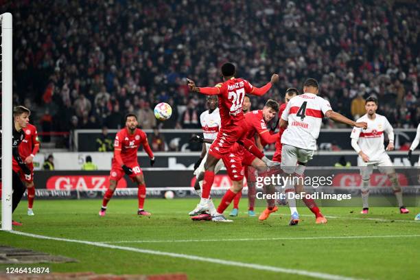Edimilson Fernandes of 1.FSV Mainz 05 and Josha Vagnoman of VfB Stuttgart battle for the ball during the Bundesliga match between VfB Stuttgart and...