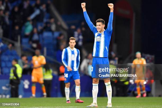 Espanyol's Spanish defender Adria Pedrosa celebrates at the end of the Spanish league football match between RCD Espanyol and Real Betis at the RCDE...