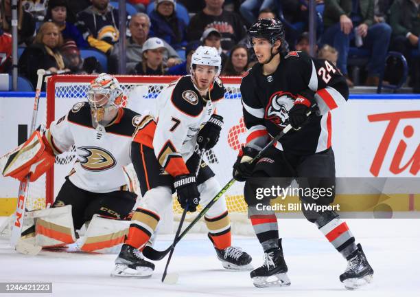 Dylan Cozens of the Buffalo Sabres is defended by Jayson Megna and John Gibson of the Anaheim Ducks during an NHL game on January 21, 2023 at KeyBank...