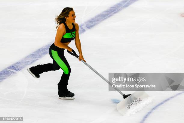 The Dallas Stars Ice Girls clear the ice during the game between the Dallas Stars and the Calgary Flames on January 14, 2023 at American Airlines...