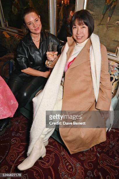 Angelica Cheung and guest attend the Holzweiler Lunar New Year celebration during Paris Fashion Week Men's at Lapérouse on January 21, 2023 in Paris,...