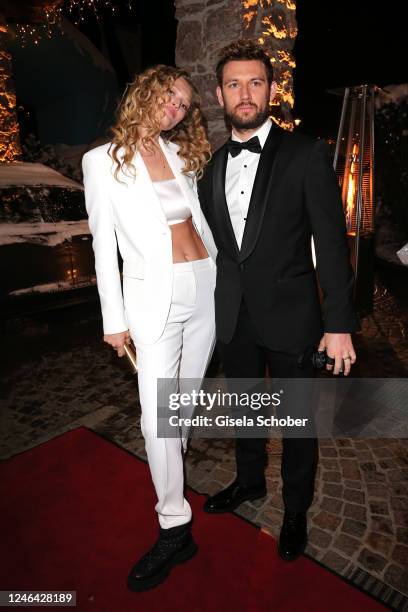 Toni Garrn and Alex Pettyfer attend the Hummerparty during the Hahnenkammrennen at Hotel Kitzhof on January 21, 2023 in Kitzbühel, Austria.