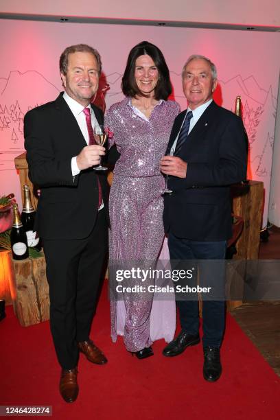 General Manager Johannes Mitterer, Uschi Mueller, CMO Motel One, and Karl Schranz attend the Hummerparty during the Hahnenkammrennen at Hotel Kitzhof...