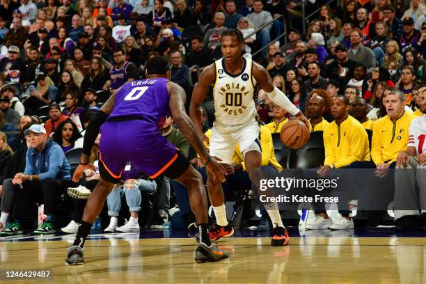 Bennedict Mathurin of the Indiana Pacers dribbles the ball during the game against the Phoenix Suns on January 21, 2023 at Footprint Center in...