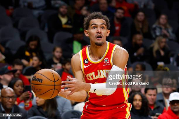 Trae Young of the Atlanta Hawks throws the ball in during the first half against the Charlotte Hornets at State Farm Arena on January 21, 2023 in...