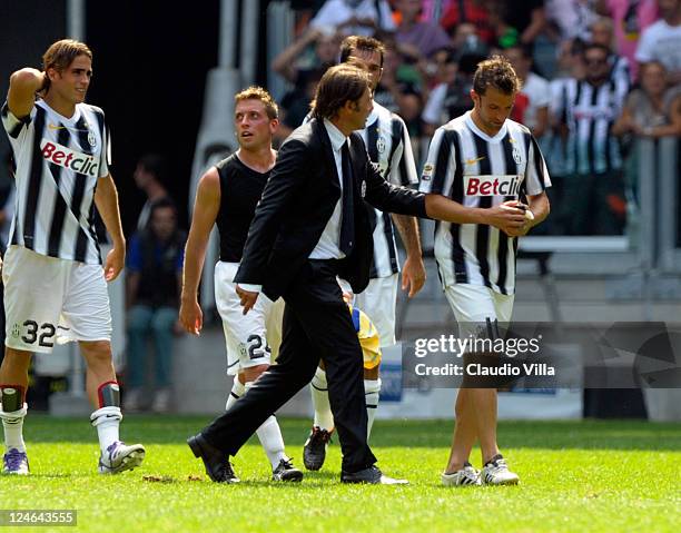 Juventus FC coach Antonio Conte speaks to his captain Alessandro Del Piero during the Serie A match between Juventus FC v Parma FC at Juventus...