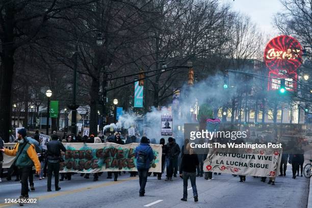 Demonstrators protest the death of environmental activist Tortuguita on Saturday, January 21, 2023 in Atlanta, Ga.