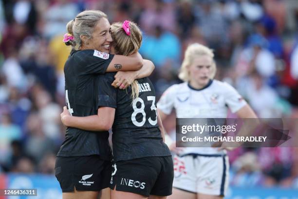 Sarah Hirini and Jorja Miller of New Zealand hug during the women's final between New Zealand and USA on day two of the World Rugby Sevens series at...