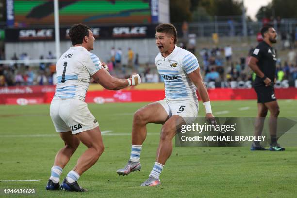 Argentinas Agustin Fraga and Rodrigo Isgro celebrate their win after the men's final between New Zealand and Argentina on day two of the World Rugby...