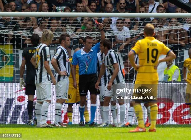 Alessandro De Ceglie of Juventus FC is shown a red card during the Serie A match between Juventus FC v Parma FC at Juventus Stadium on September 11,...