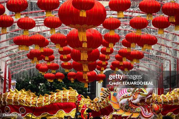 238m-long dragon dance passes by Leal Senado Square during celebrations on the first day of the Chinese lunar new year in Macau on January 22, 2023.