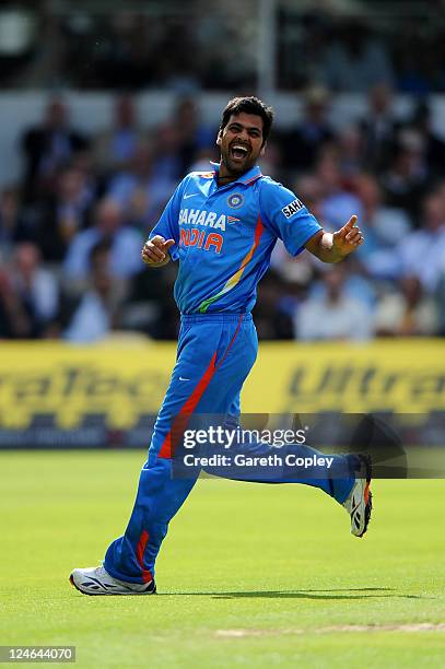 Singh of India celebrates claiming the wicket of Alastair Cook of England during the 4th Natwest One Day International match between England and...
