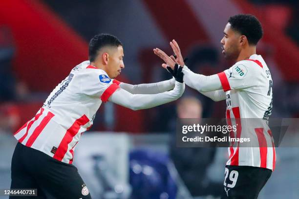 Mauro Junior of PSV Eindhoven Phillipp Mwene of PSV Eindhoven substitutes during the Dutch Eredivisie match between PSV Eindhoven and SBV Vitesse at...