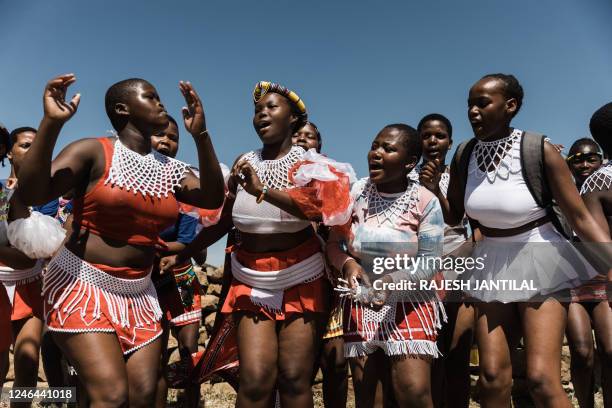 Zulu maidens sing and dance during the reenactment of the Battle of Isandlwana, in Isandlwana on January 21, 2023. - The reenactment is performed...