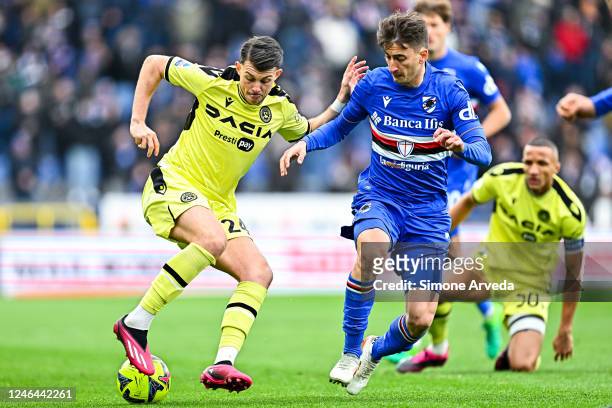 Lazar Samardzic of Udinese and Filip Djuricic of Sampdoria vie for the ball during the Serie A match between UC Sampdoria and Udinese Calcio at...