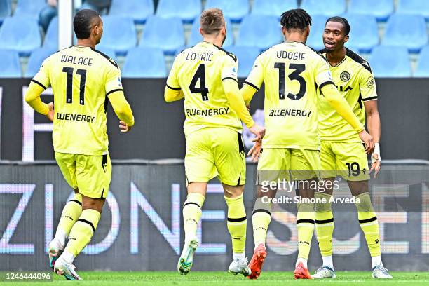 Kingsley Ehizibue of Udinese celebrates with his team-mates after scoring a goal during the Serie A match between UC Sampdoria and Udinese Calcio at...
