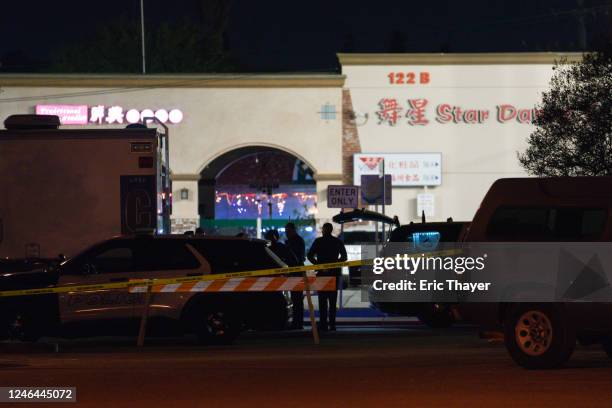 Law enforcement at the scene of a shooting on January 22, 2023 in Monterey Park, California. Ten people have been shot dead during at a gathering...