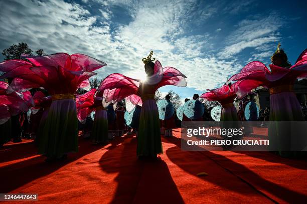 Performers take part in a parade celebrating the Chinese Lunar New Year of the Rabbit, in central Milan, Italy, on January 22, 2023.