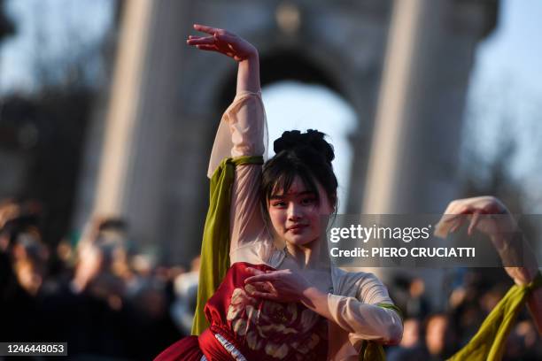 Performers take part in a parade celebrating the Chinese Lunar New Year of the Rabbit, in central Milan, Italy, on January 22, 2023.