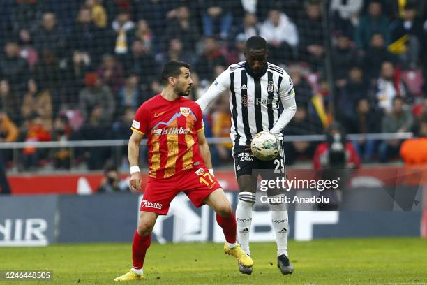 Masuaku of Besiktas in action against Emrah Bassan of Yukatel Kayserispor during Turkish Super Lig week 20 match between Yukatel Kayserispor and...