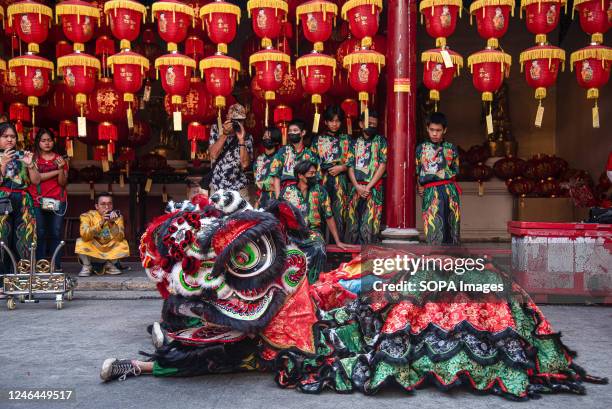 Lion dancers seen preparing before the performance during the Lunar new year celebration at the Canton shrine in Bangkok.