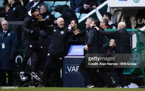Lee McCulloch and the Hearts bench celebrate during a Scottish Cup Fourth Round match between Hibernian and Heart of Midlothian at Easter Road, on...