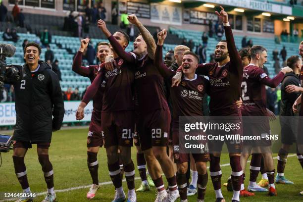 Hearts players celebrate at Full Time during a Scottish Cup Fourth Round match between Hibernian and Heart of Midlothian at Easter Road, on January...