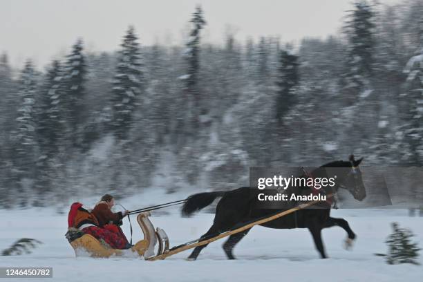 January 22 A competitor is seen in action in the chariots couple category, during the 2023 edition of Kumoterki in Bialy Dunajec, Poland, on January...