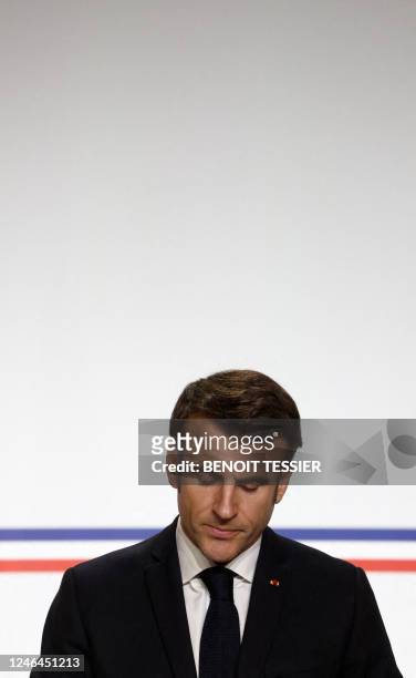 French President Emmanuel Macron holds a press conference with German Chancellor , following a Franco-German joint cabinet meeting as part of the...