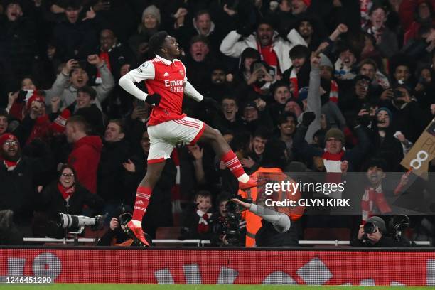 Arsenal's English striker Eddie Nketiah celebrates after scoring their first goal during the English Premier League football match between Arsenal...