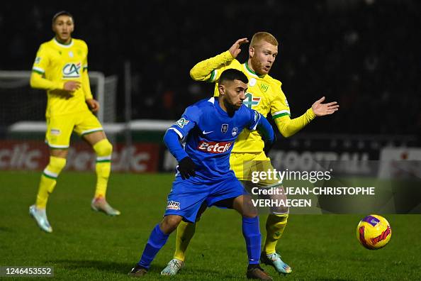 Koriche Thaon's French Algerian midfielder Karim Koriche fights for the ball ...