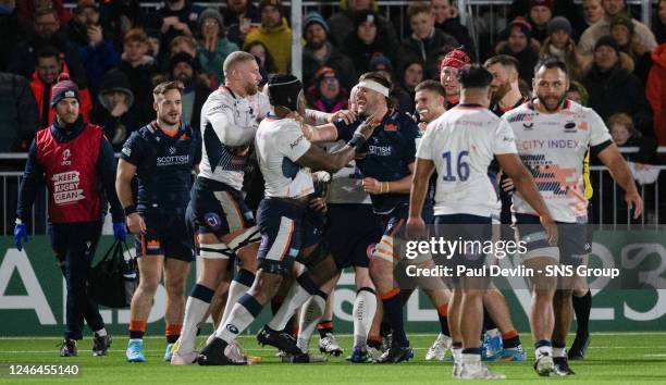 Edinburgh's Nick Haining and Scaracens' Maro Itoje have an exchange during a Heineken Champions Cup match between Edinburgh and Saracens at the DAM...