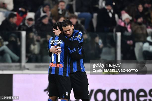 Atalanta's British midfielder Ademola Lookman celebrates with Atalanta's Argentinian defender Jose Luis Palomino after scoring the opening goal...