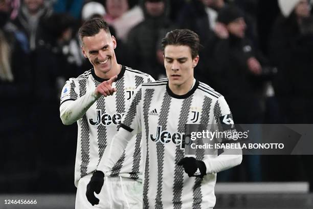 Juventus' Polish forward Arkadiusz Milik celebrates after scoring his team's second goal during the Italian Serie A football match between Juventus...