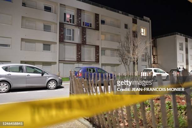 Picture taken in Saint-Brieuc, western France, on January 22, 2023 shows the appartment building where a man shot his partner and their daughter...