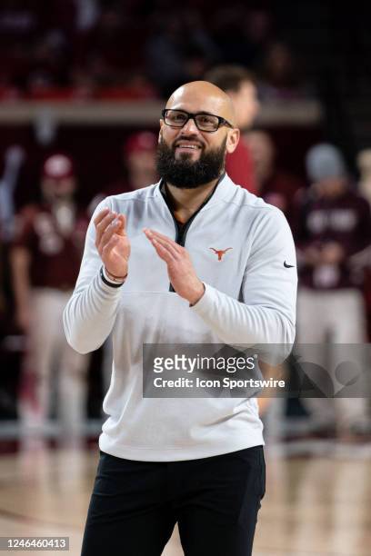 Texas Longhorns Strength and Conditioning Coach John Reilly encourages players during warmups before the mens college basketball game between the...