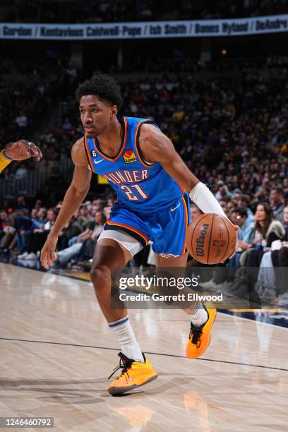 Aaron Wiggins of the Oklahoma City Thunder drives to the basket during the game against the Denver Nuggets on January 22, 2023 at the Ball Arena in...